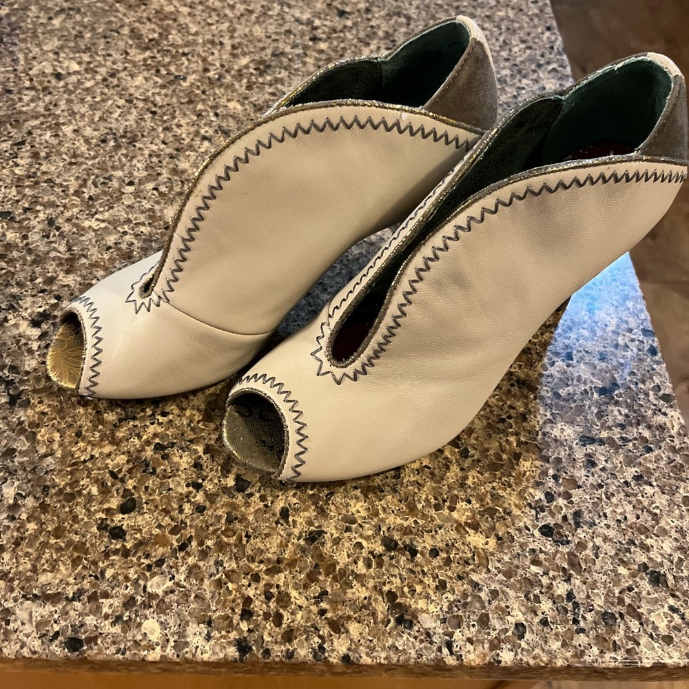 Poetic License White Heeled Boots with Peep-Toe Design